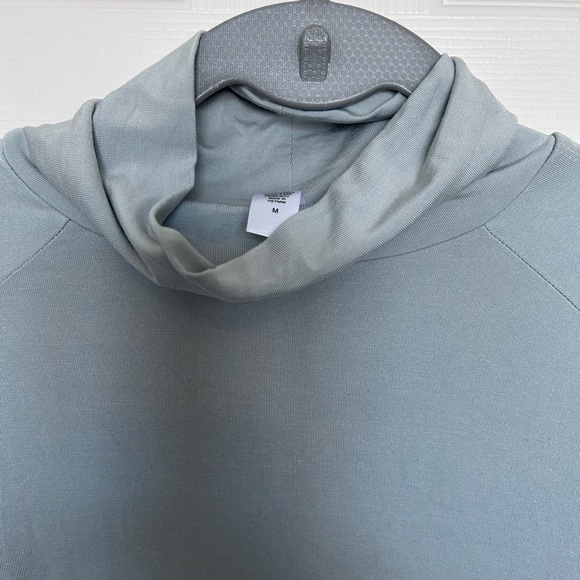 Athleta long sleeve soft cold shoulder solid turtleneck top on grey. Size M - Picture 7 of 8